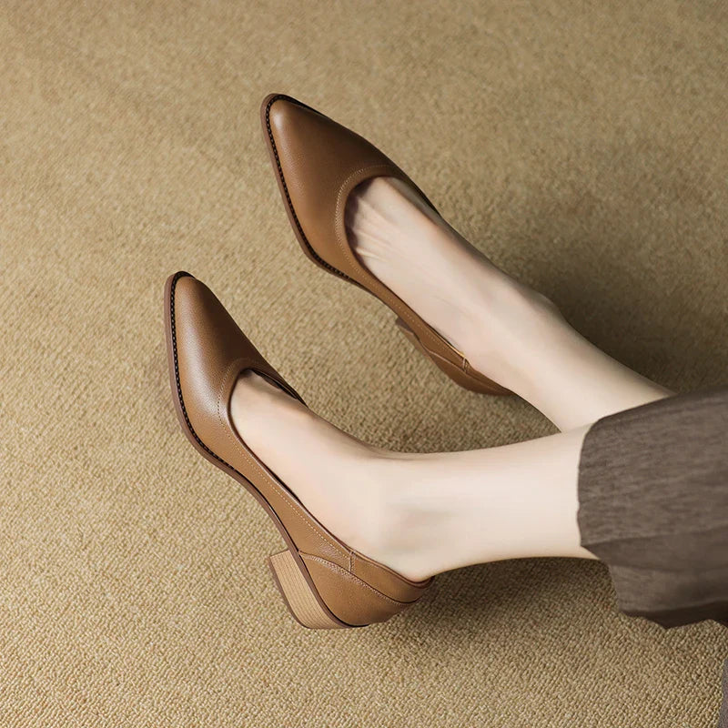 Detail of slip-on pointed toe pumps showing secure fit and tapered toe shape