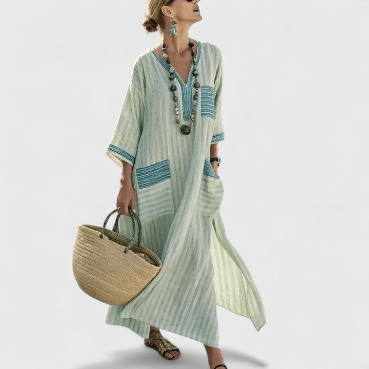 Woman in beige Elegant Boho Dress styled with statement jewelry and sandals for casual wear