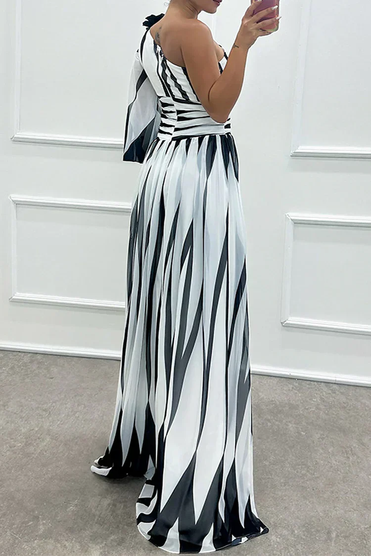 Full length view of flowing striped maxi dress with A-line skirt and elegant drape