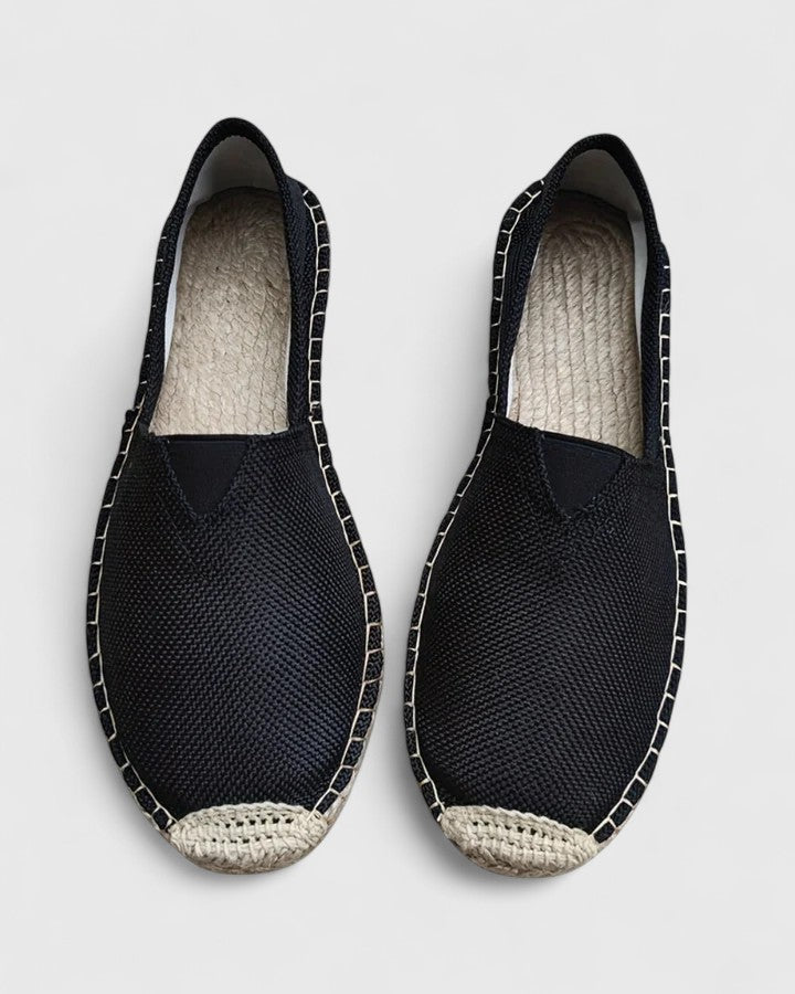 Women's slip-on espadrilles in neutral white color with textured canvas upper