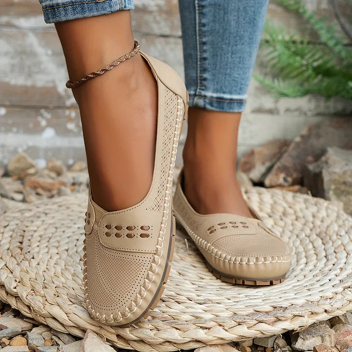Women's orthopedic slip on loafers in brown featuring breathable perforations and supportive contoured insole