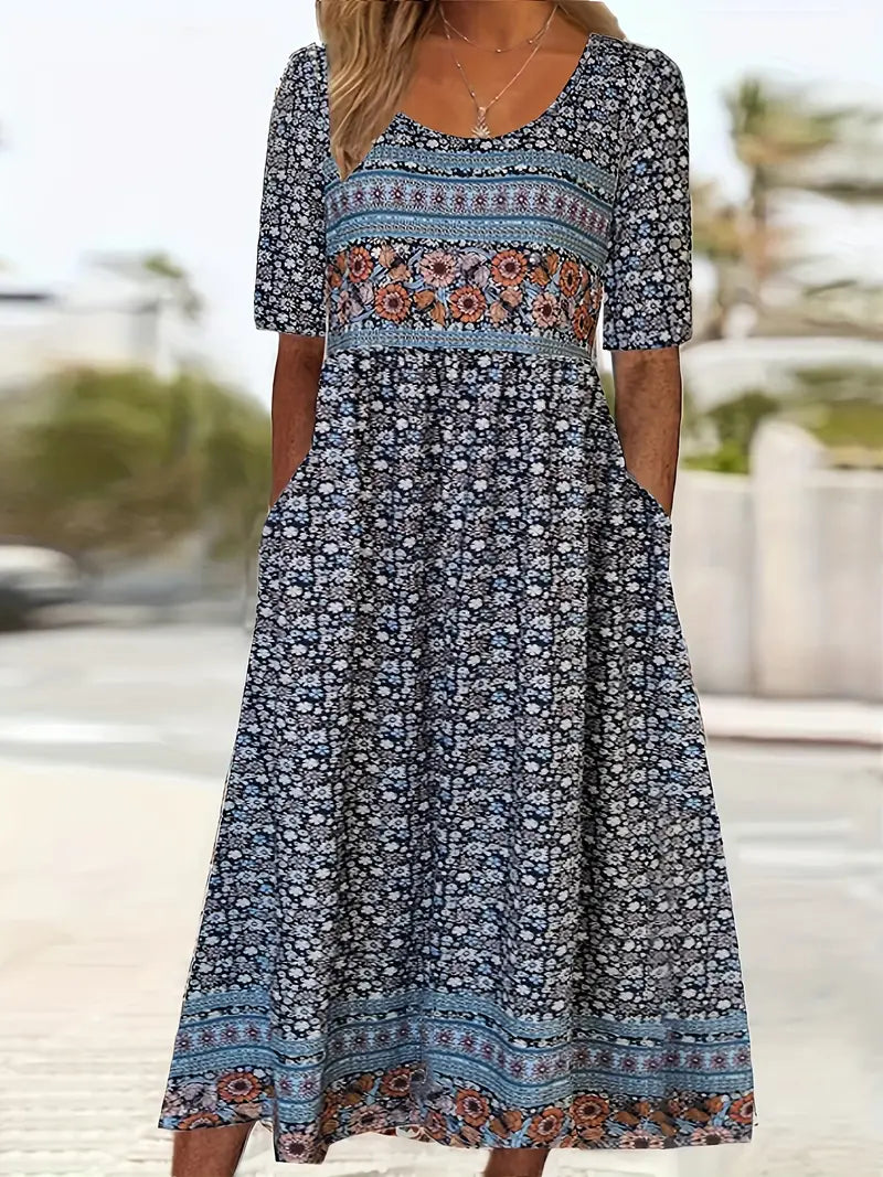 Flowing midi dress featuring square neckline and short sleeves with boho-inspired border print details