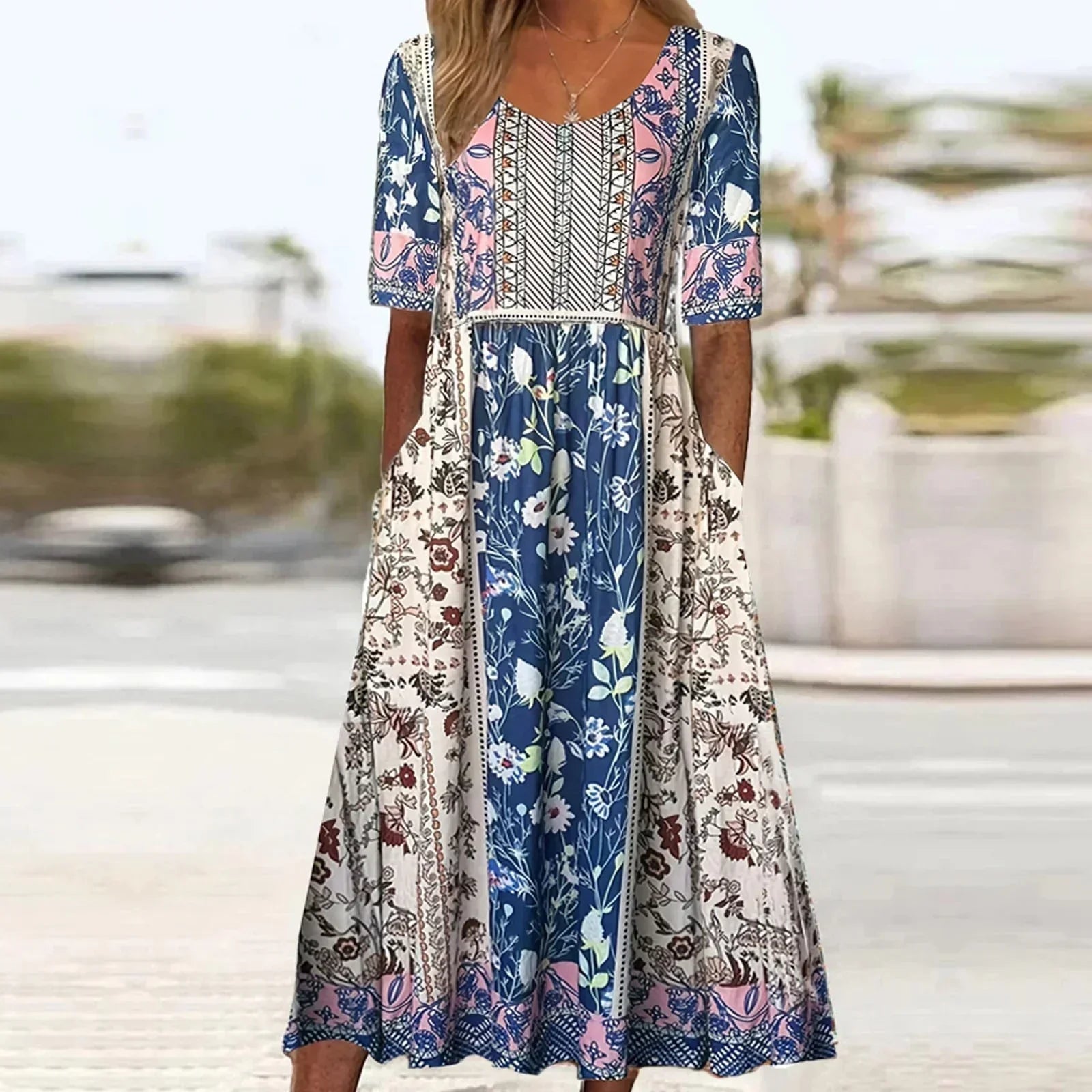 Relaxed A-line silhouette midi dress with contrasting bodice panel and lightweight woven fabric