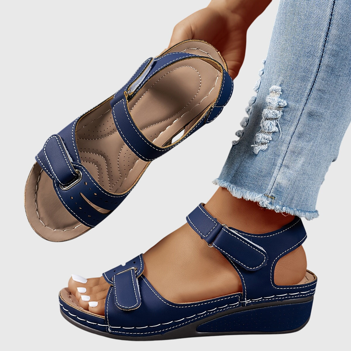 Women's orthopedic sandals in red with adjustable straps and low wedge heel
