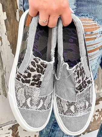 Women's orthopedic slip-on sneakers with mixed-print upper and white rubber sole, styled for casual everyday outfits
