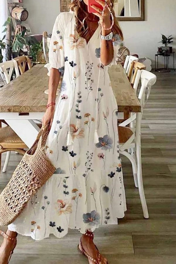 Women's Boho Floral Short Sleeve Maxi Dress in white with delicate floral print and flowing silhouette
