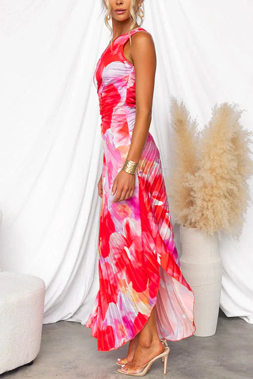 Close up of pleated fabric detail on flowing summer dress with floral pattern