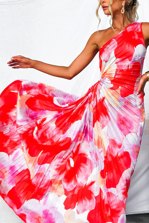 Side view of pleated summer dress showing asymmetric hem and fitted bodice