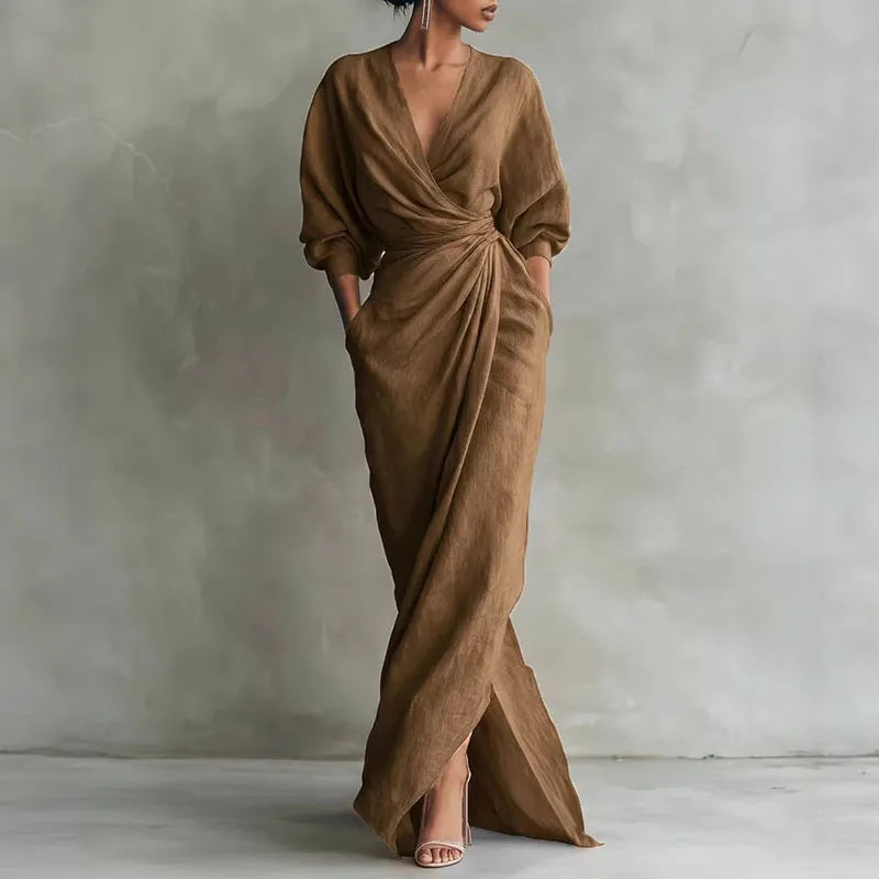 Close-up of wrap waist detail and V neckline on long maxi dress