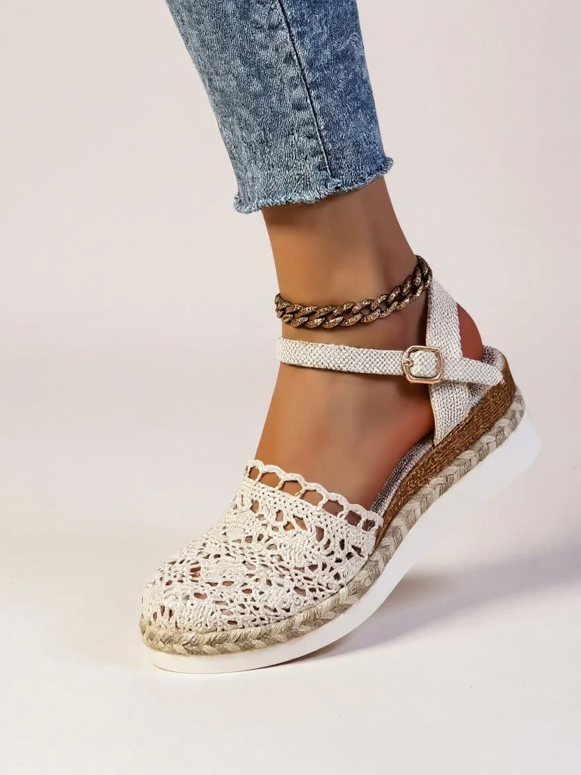 Three-quarter view of boho wedge espadrille ankle strap sandals highlighting open-toe design and braided trim