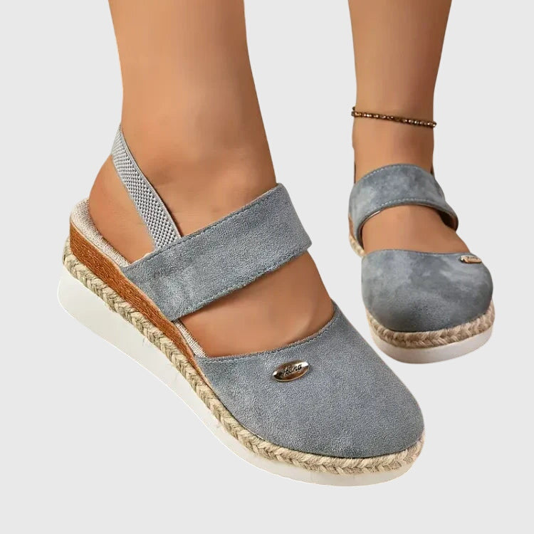 Close-up of orthopedic sandal footbed with cushioned insole and closed-toe design for secure fit