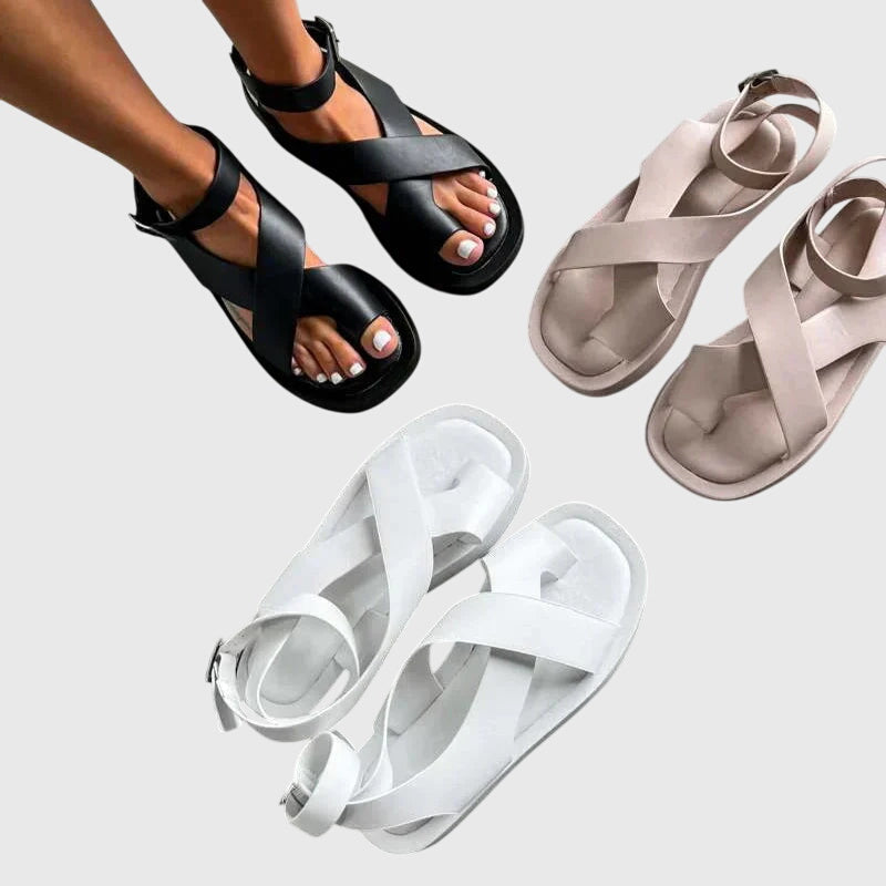 Women's gladiator platform sandals in coral orange showing crisscross straps, toe loop, and chunky black platform sole design
