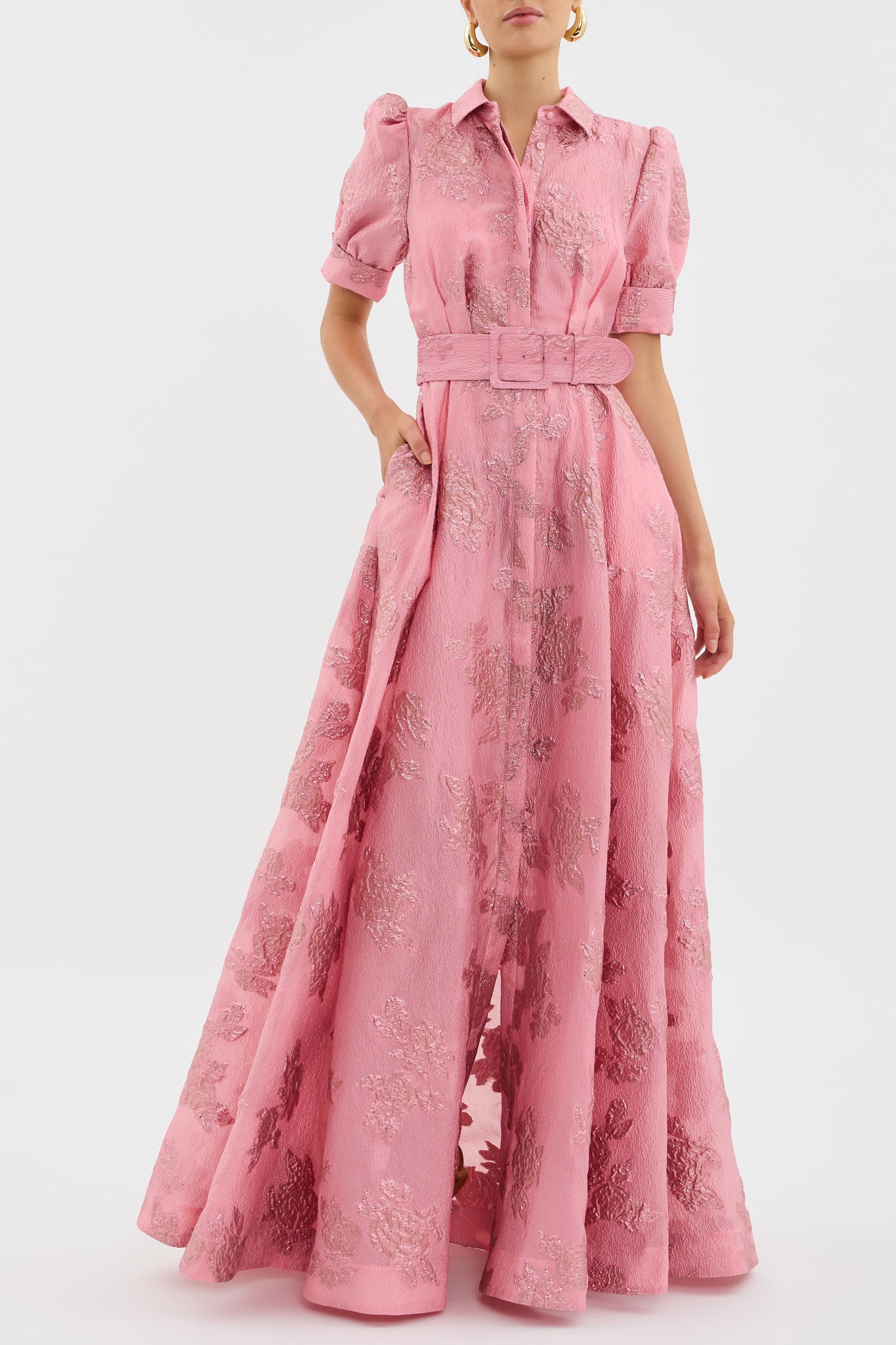 Floor-length pink maxi dress with belted waist and A-line silhouette for formal occasions
