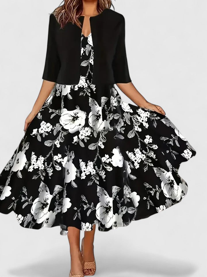 Close-up of floral print detailing on the hem of the Elegant Midi Floral Dress