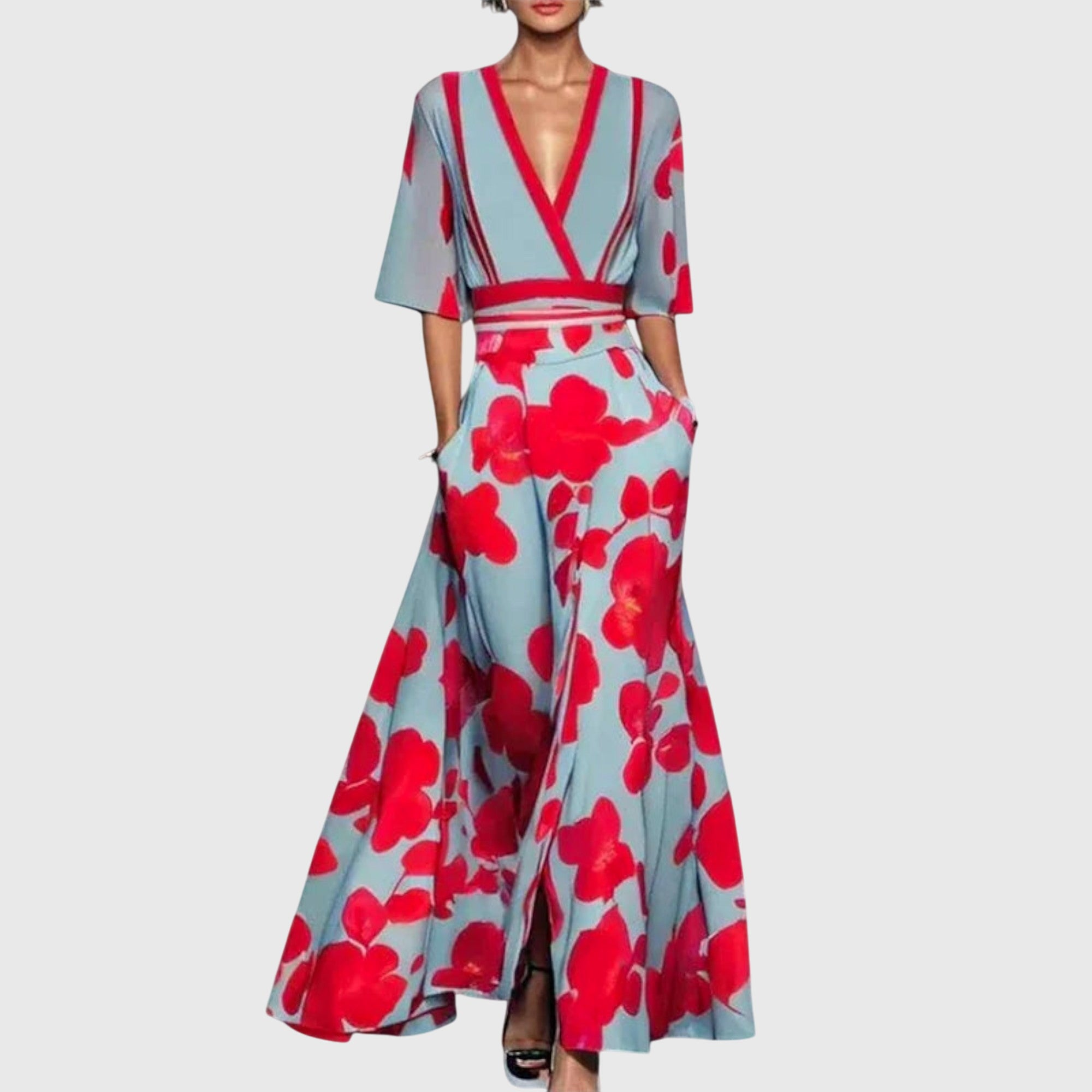 Close-up view of wrap V-neckline and three-quarter sleeves on maxi floral dress with vibrant print