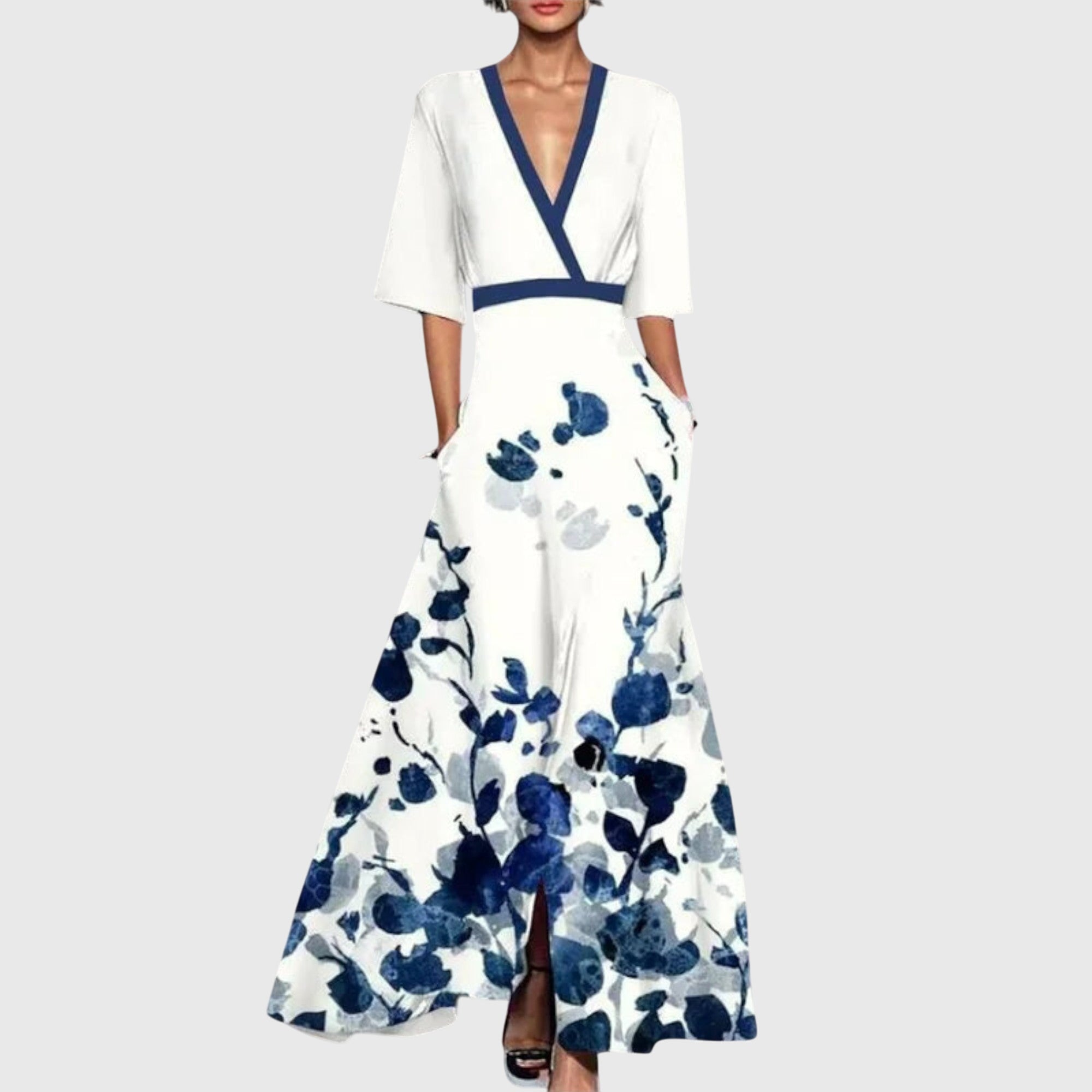 Detail of bodice wrap construction and waist definition on maxi floral dress