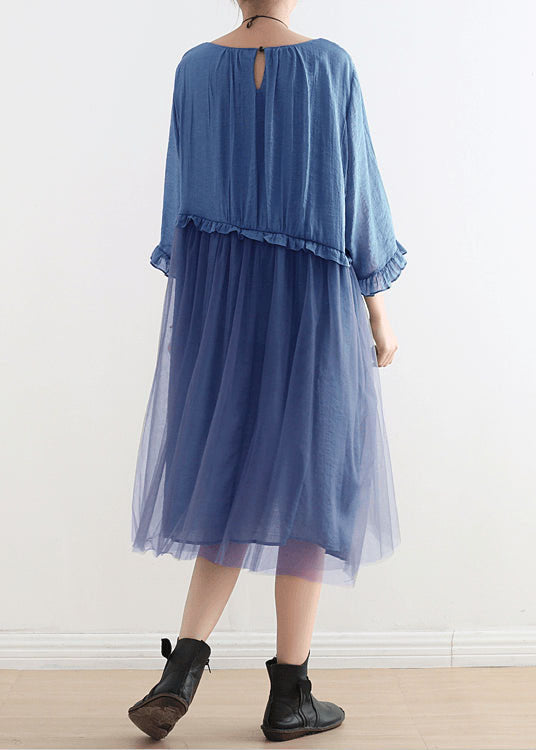 Woman in motion wearing airy tulle dress with visible fabric movement and drape