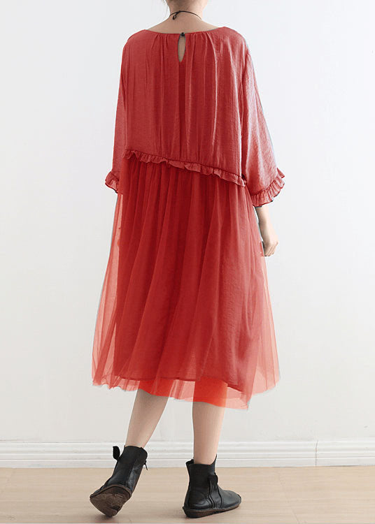 Back and side view of layered tulle dress showing sheer overlay and midi length
