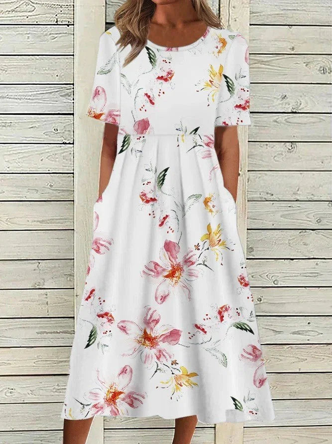 Full-length view of the Printed Floral Midi Dress displaying flowing midi skirt with functional side pockets and balanced silhouette