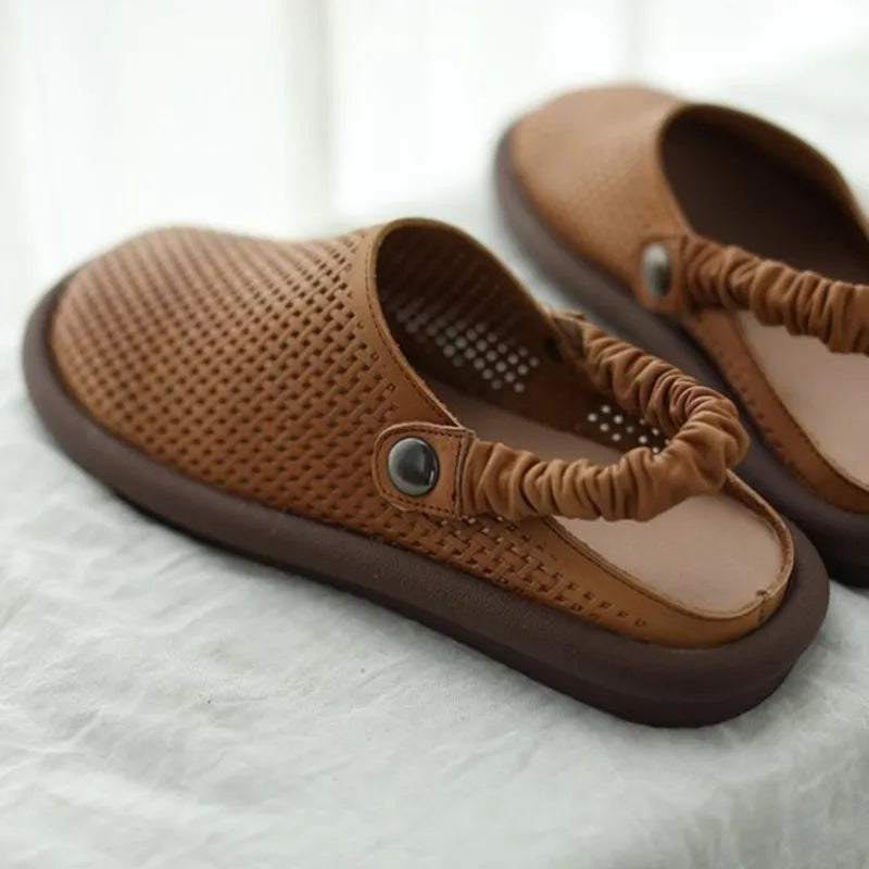 Close-up of adjustable strap detail on women's cushioned sandals with textured upper surface
