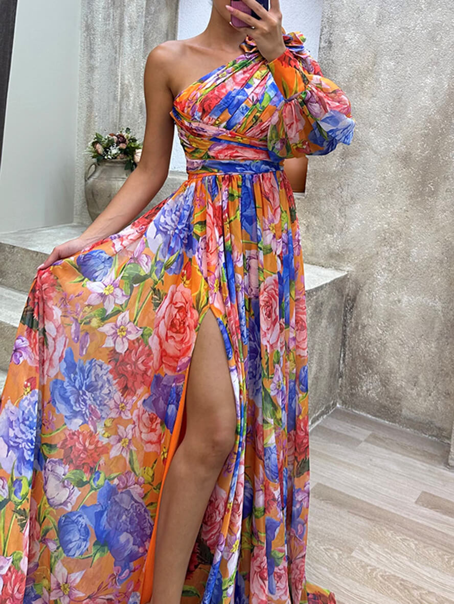 One shoulder evening dress in vibrant floral print with fitted waist and elegant floor-length silhouette