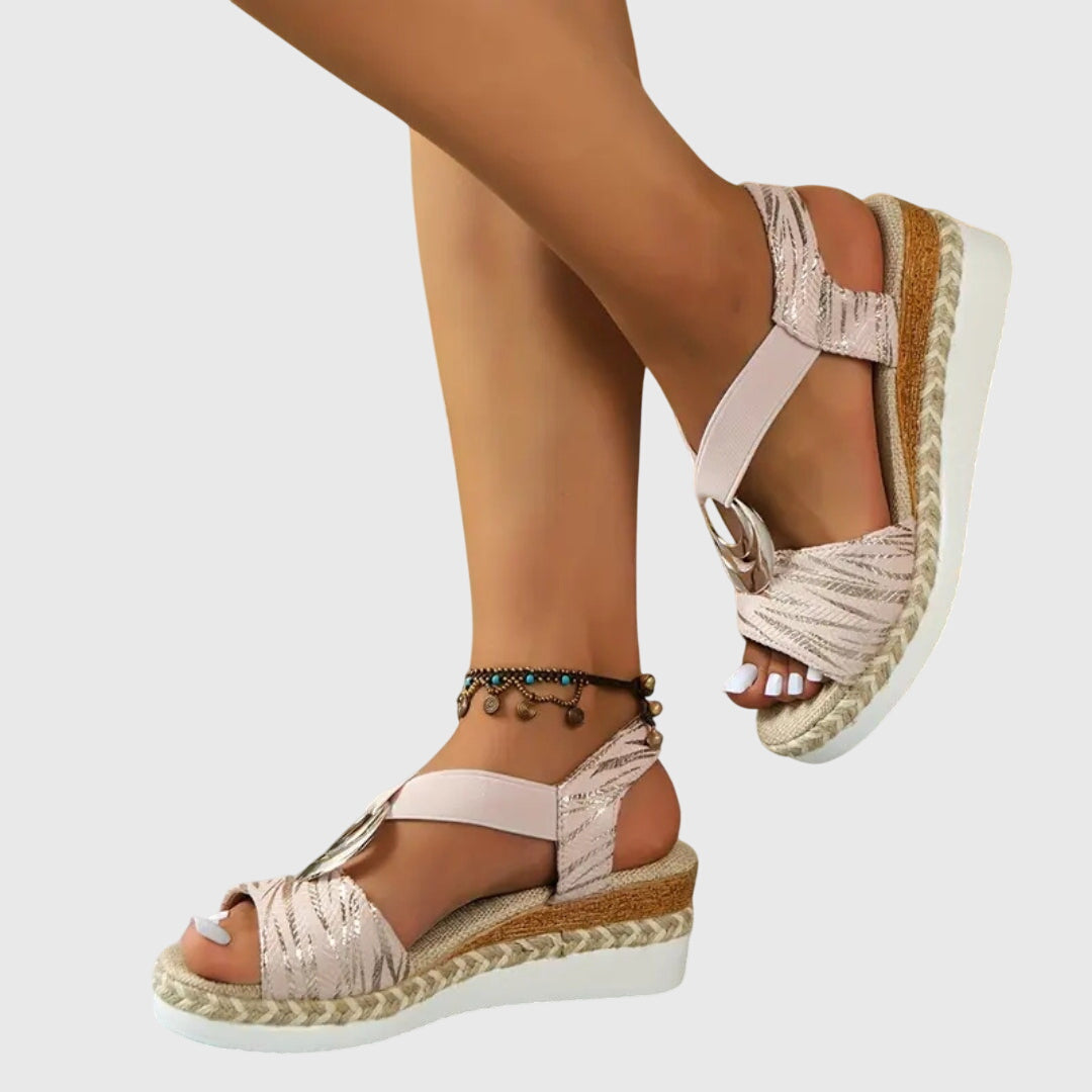 Detail shot of crossover strap design on women's orthopedic sandals with textured finish and platform construction