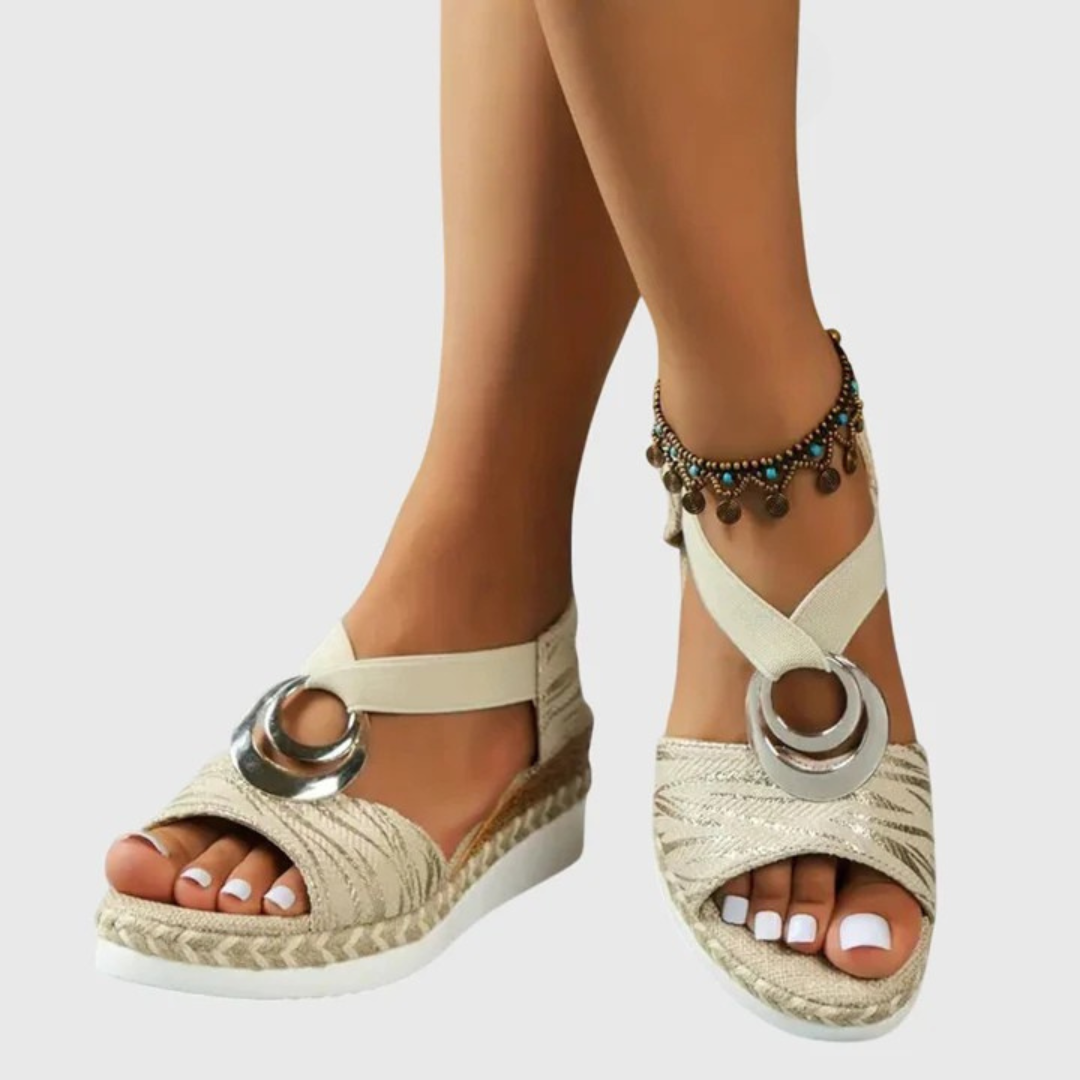 Full view of orthopedic sandals featuring contoured footbed, crossover straps, and cushioned platform construction