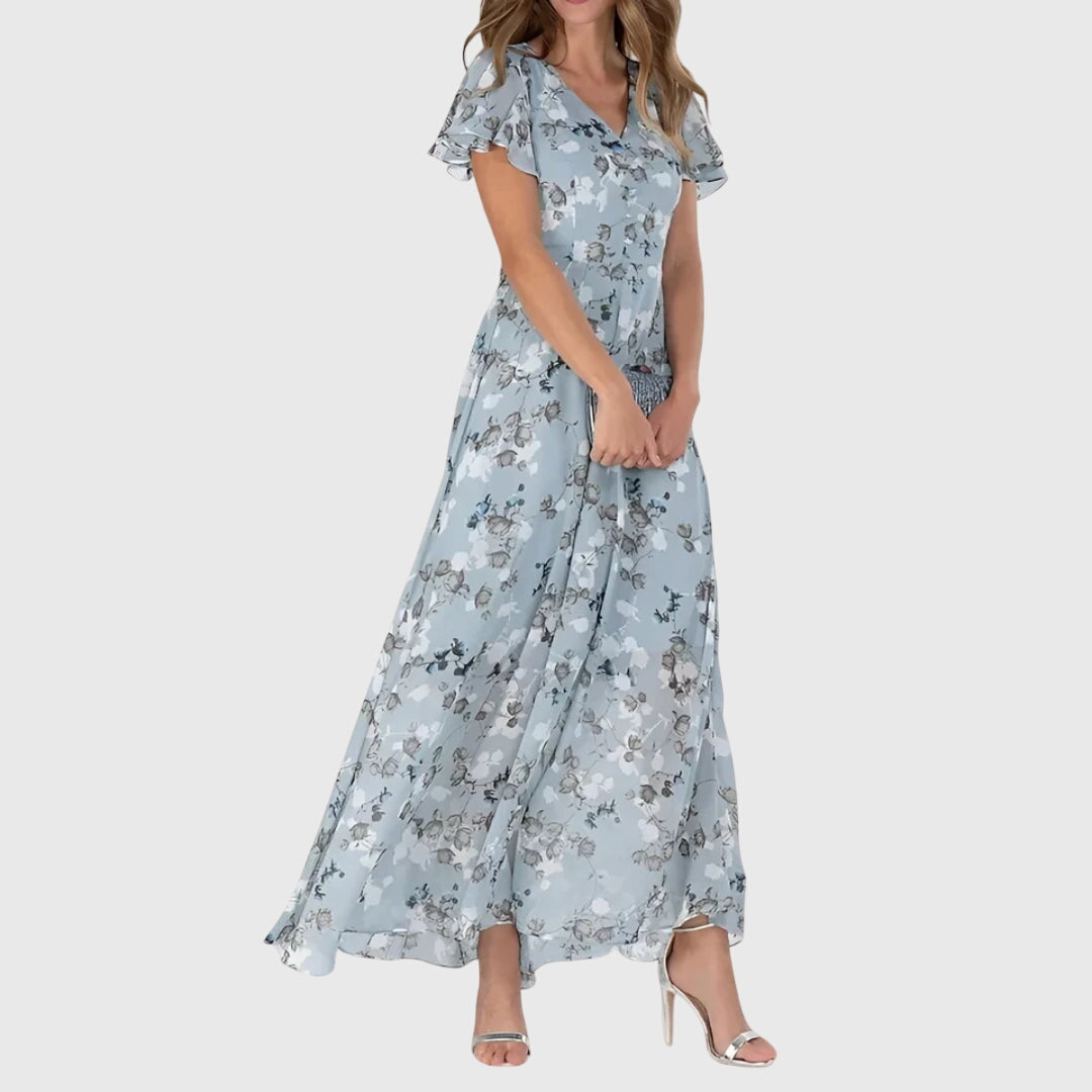 Side view of floral maxi dress showing flowing tiered skirt and relaxed fit silhouette