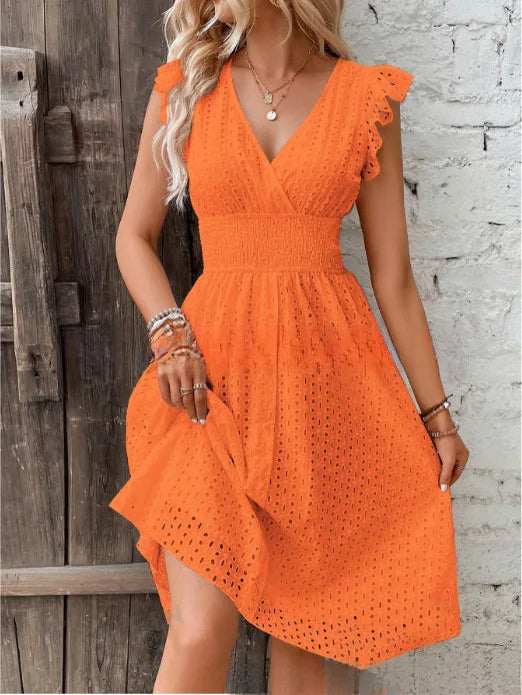 Front view of V-neck summer dress highlighting surplice neckline and ruffled sleeves