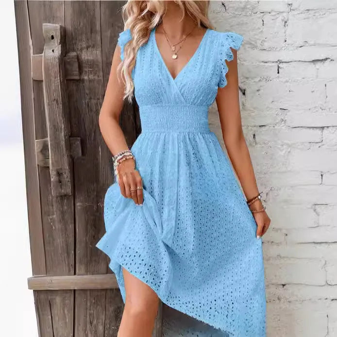 Back view of summer dress displaying ruffled cap sleeves and eyelet fabric detail
