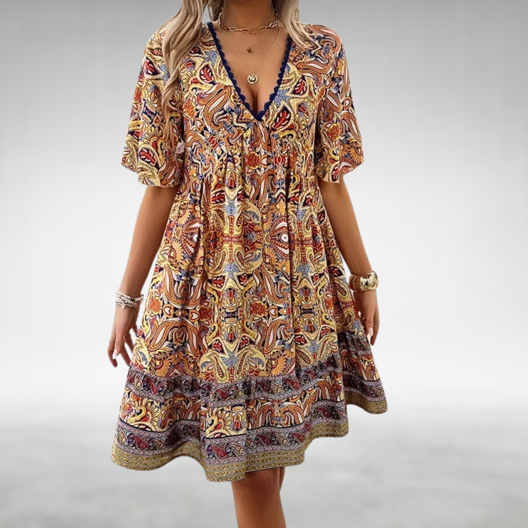 Full-length view of casual boho dress with tiered hem and short sleeves