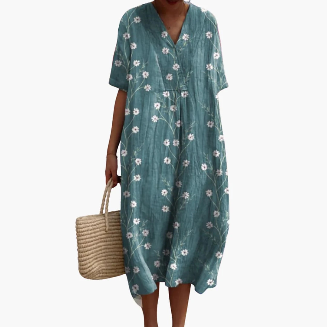 Back view of oversized midi dress showing short sleeves and relaxed drop cut