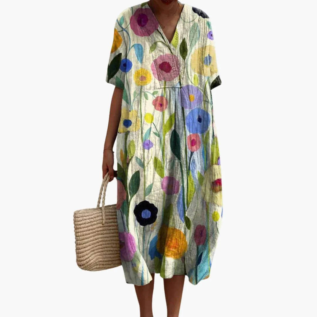 Floral print detail on crinkle-textured midi dress fabric with multicolor blooms