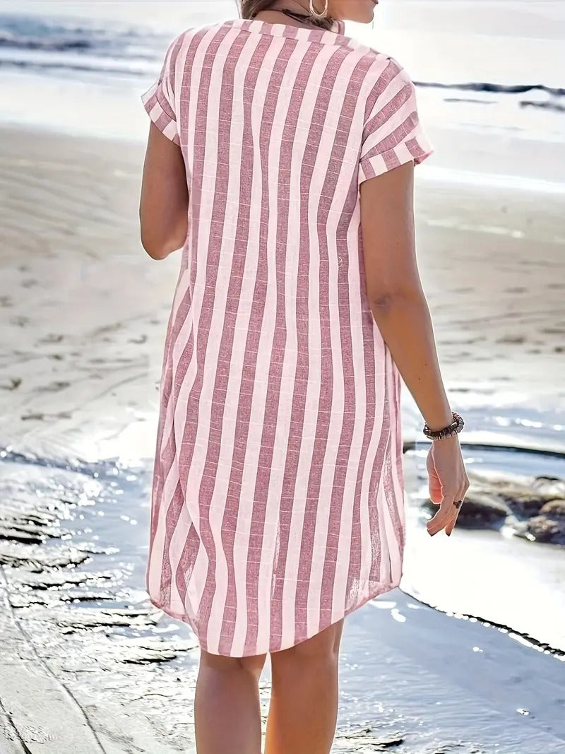 Full-length view of blue and white striped shirt dress styled with casual accessories