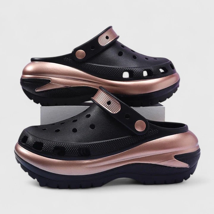 Overhead view of cushioned footbed and ventilation holes on orthopedic sandals clogs
