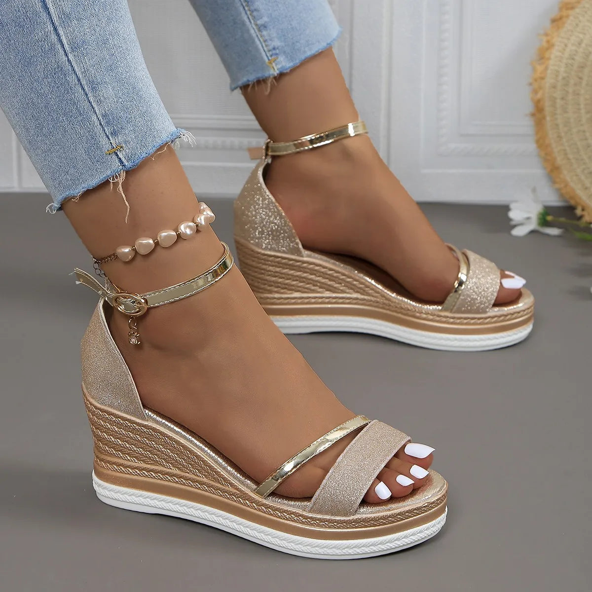Detail of womens platform wedge strap sandals featuring buckle closure ankle strap and white contrast sole trim