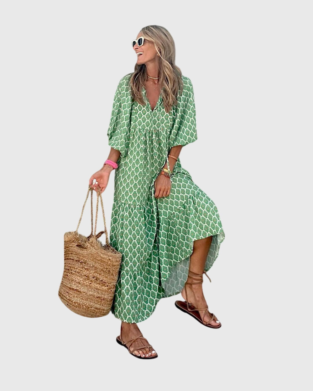 Woman styling Boho Maxi Dress with sunglasses and woven handbag for casual look
