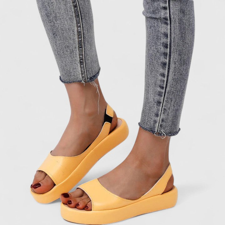 Overhead view of orthopedic sandals displaying open-toe silhouette and smooth upper construction