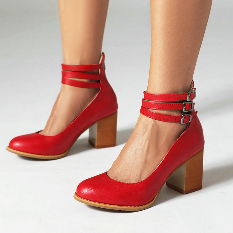 Smooth sandals with ankle strap and thick heel styled with cropped denim for everyday wear