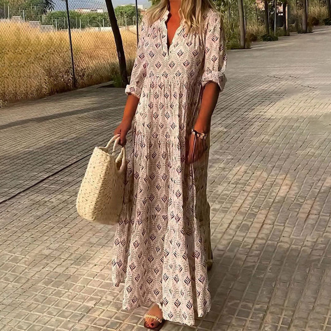Woman styling Maxi Boho Print Dress with sandals and woven bag for casual look