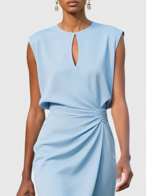 Elegant sophisticated dress in navy blue with sleeveless cut and wrapped waist design