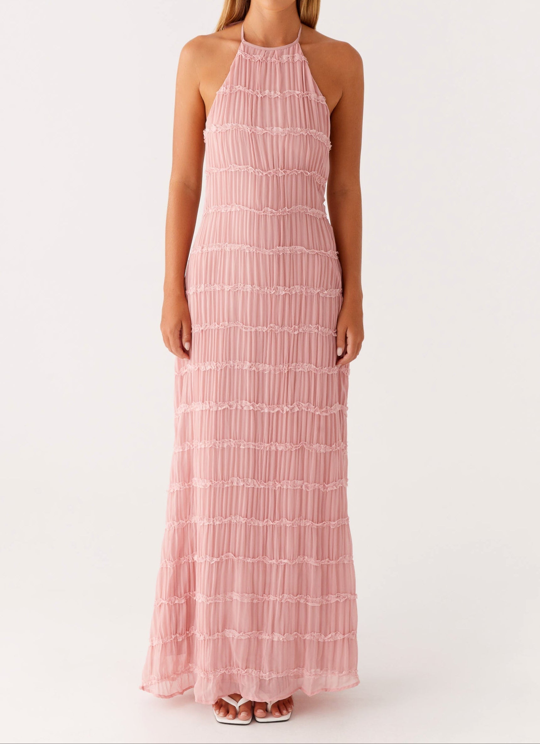 Halter maxi dress in pink shade showing adjustable neckline and flowing skirt