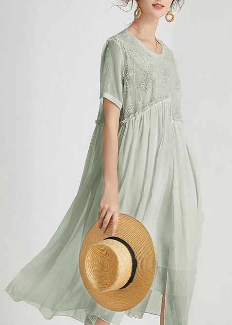 Close-up view of embroidered floral motifs on the empire waist bodice of the Boho Chiffon Summer Maxi Dress