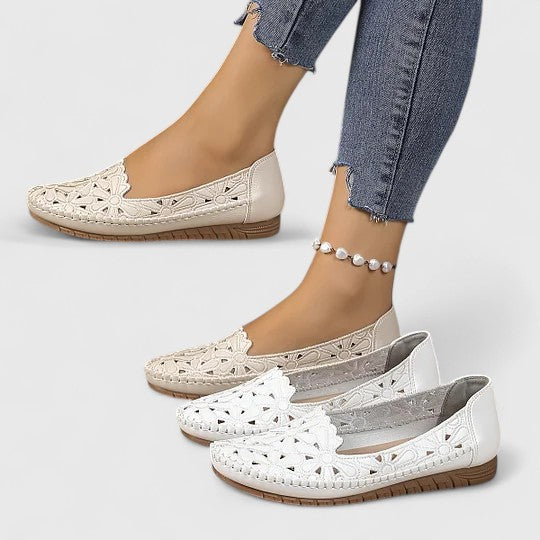 Women's perforated slip on flats in beige and white with breathable cutout design and closed toe