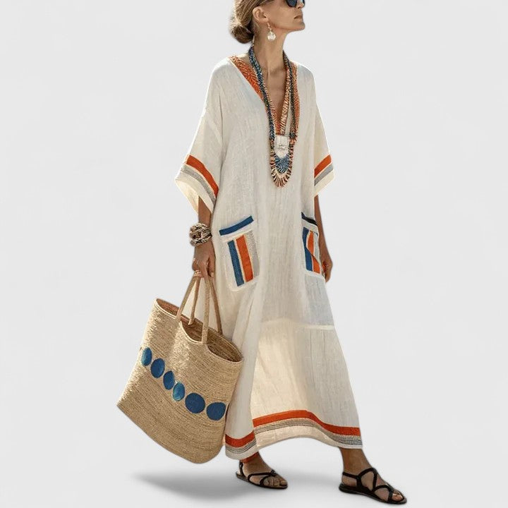 Side view of relaxed fit Elegant Boho Dress showing functional pockets and flowing maxi length