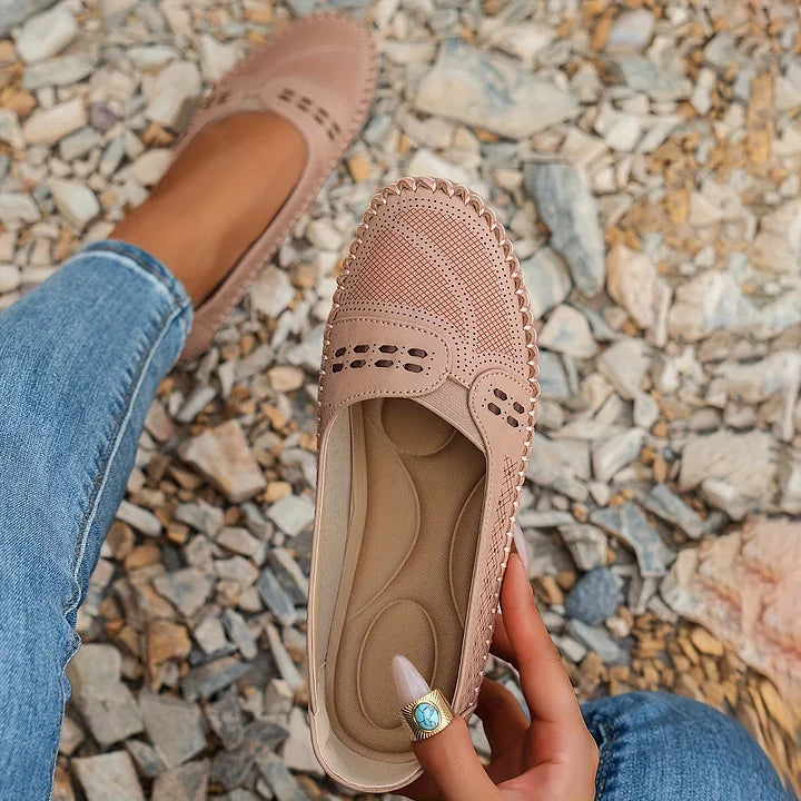 Women's orthopedic slip on loafers in light pink with perforated upper and slip-on design for easy wear