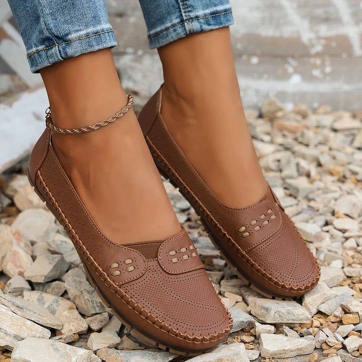 Detail of cushioned insole in women's orthopedic slip on loafers designed for arch support and pressure relief