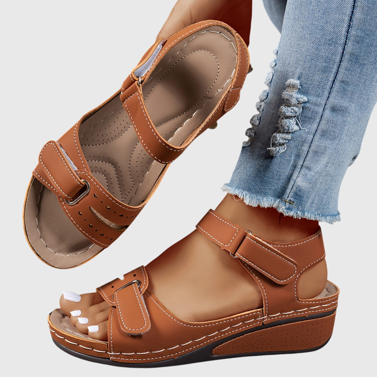 Front view of adjustable strap orthopedic sandals with molded insole and textured platform