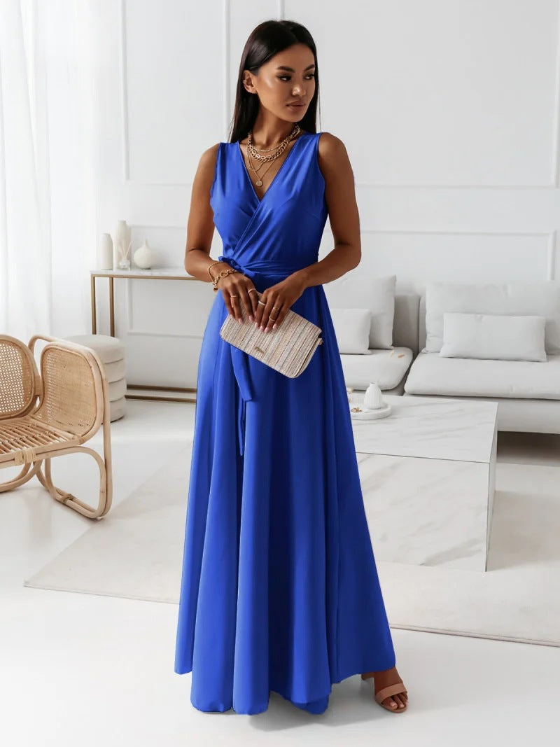 Detail of V-neckline and wrap tie on wedding guest maxi dress
