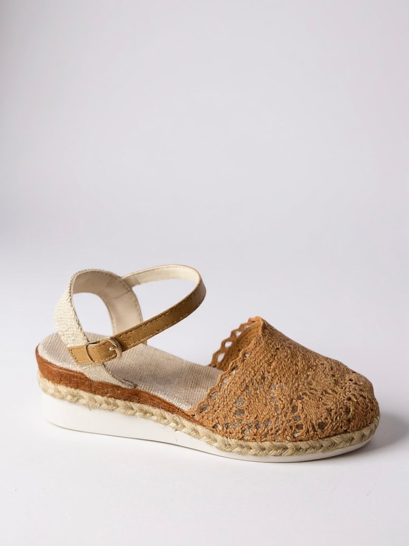 Overhead view of boho wedge espadrille ankle strap sandals showing intricate crochet pattern and open-toe design